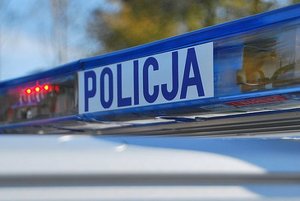 napis Policja na radiowozie